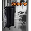 Calorifer electric cu ulei HAUSBERG HB-8915, 3 trepte, 800-1200-2000 W, 9 elementi 110 mm x 580 mm, termostat reglabil, maner si rotite pentru o deplasare facila, indicator luminos functionare, negru
